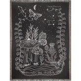 Sagittarius woven blanket featuring intricate designs, butterflies, and mushrooms, perfect gift for astrology lovers.
